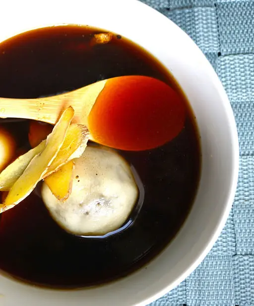 Black Sesame Rice Balls with Spicy Ginger Soup